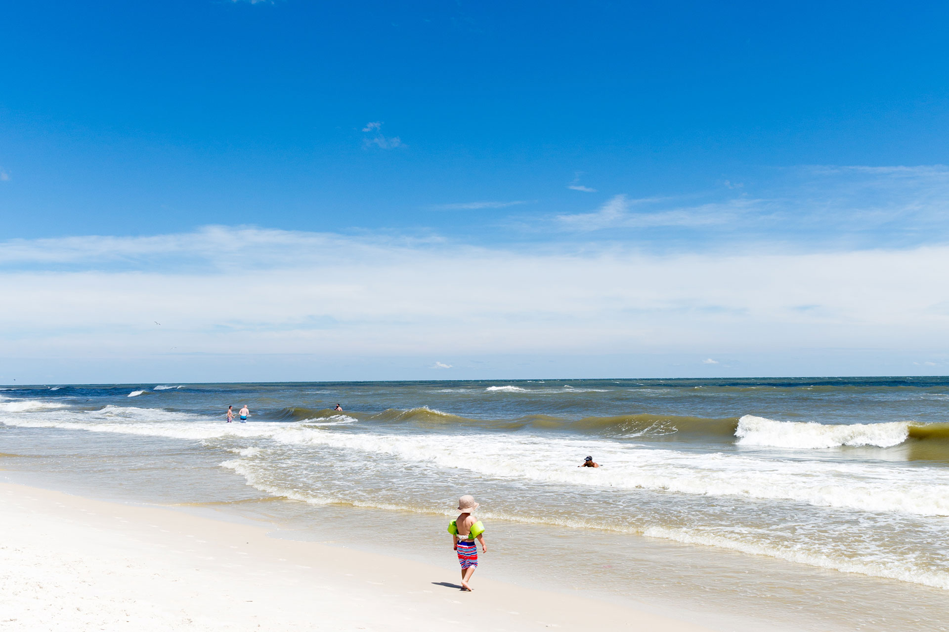 Child on Beach in Gulf Shores, Alabama; Courtesy of Gulf Shores & Orange Beach Tourism