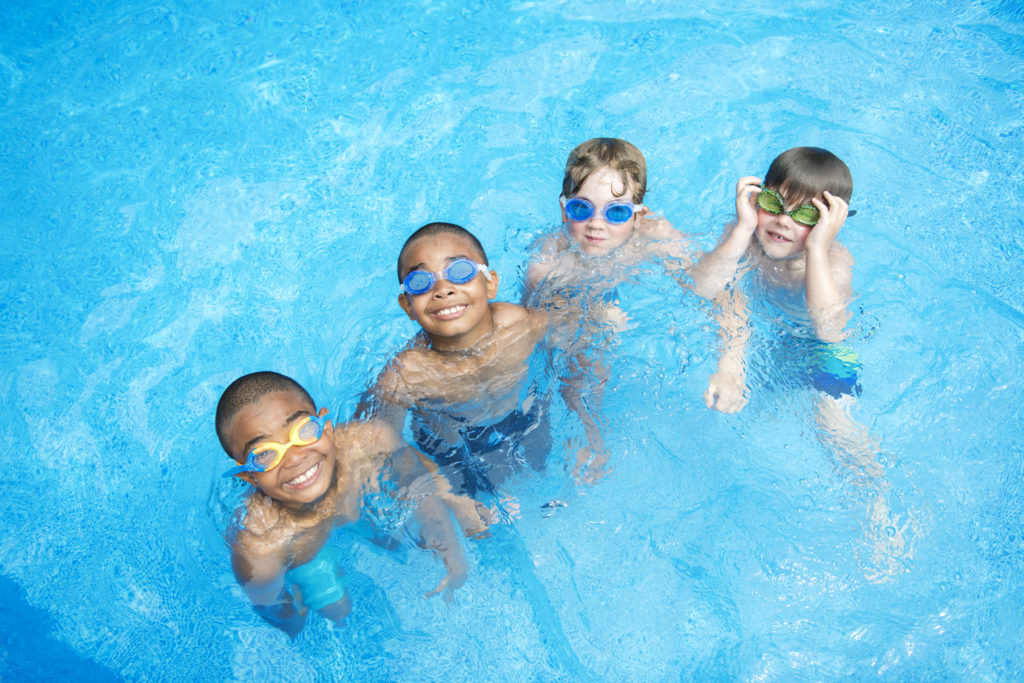 Children swimming in pool