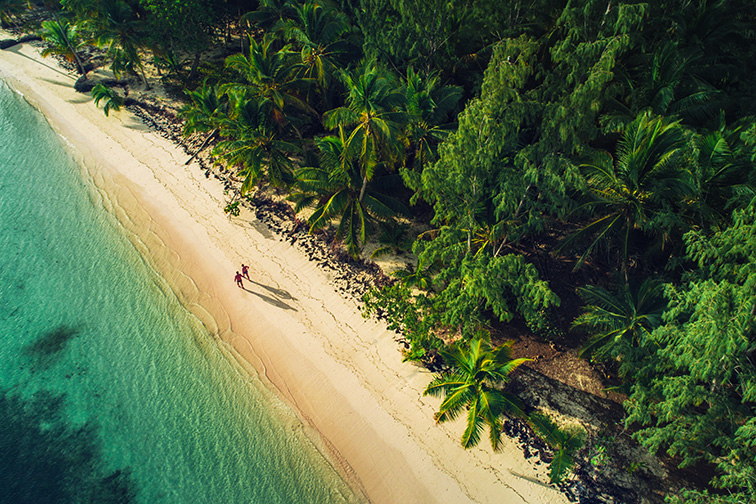 Aerial view of tropical island beach, Dominican Republic; Courtesy of Valentin Valkov/Shutterstock