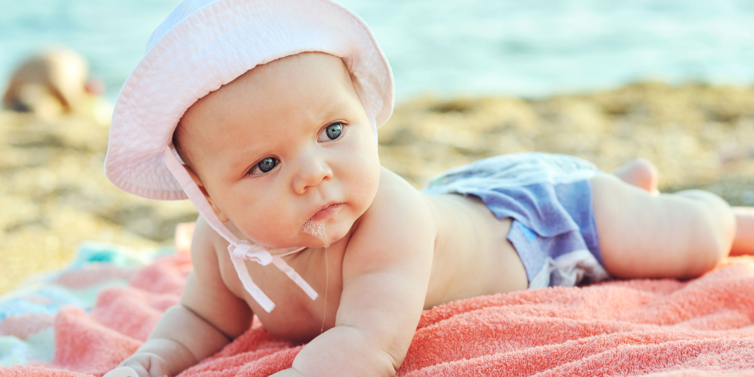 Baby on Beach; Courtesy of Elena Stepanova/Shutterstock.com