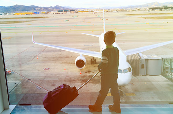 child travelling on plane alone