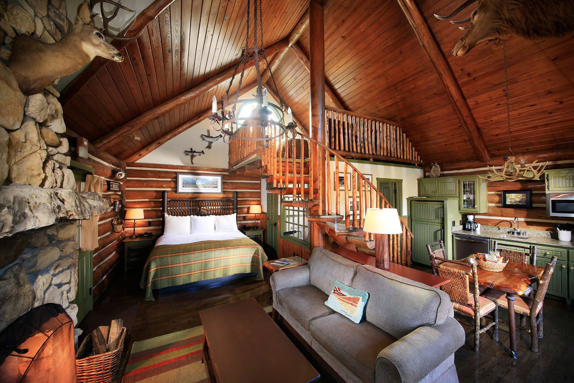 Private one bedroom with loft log cabin interior; Courtesy of Big Cedar Lodge