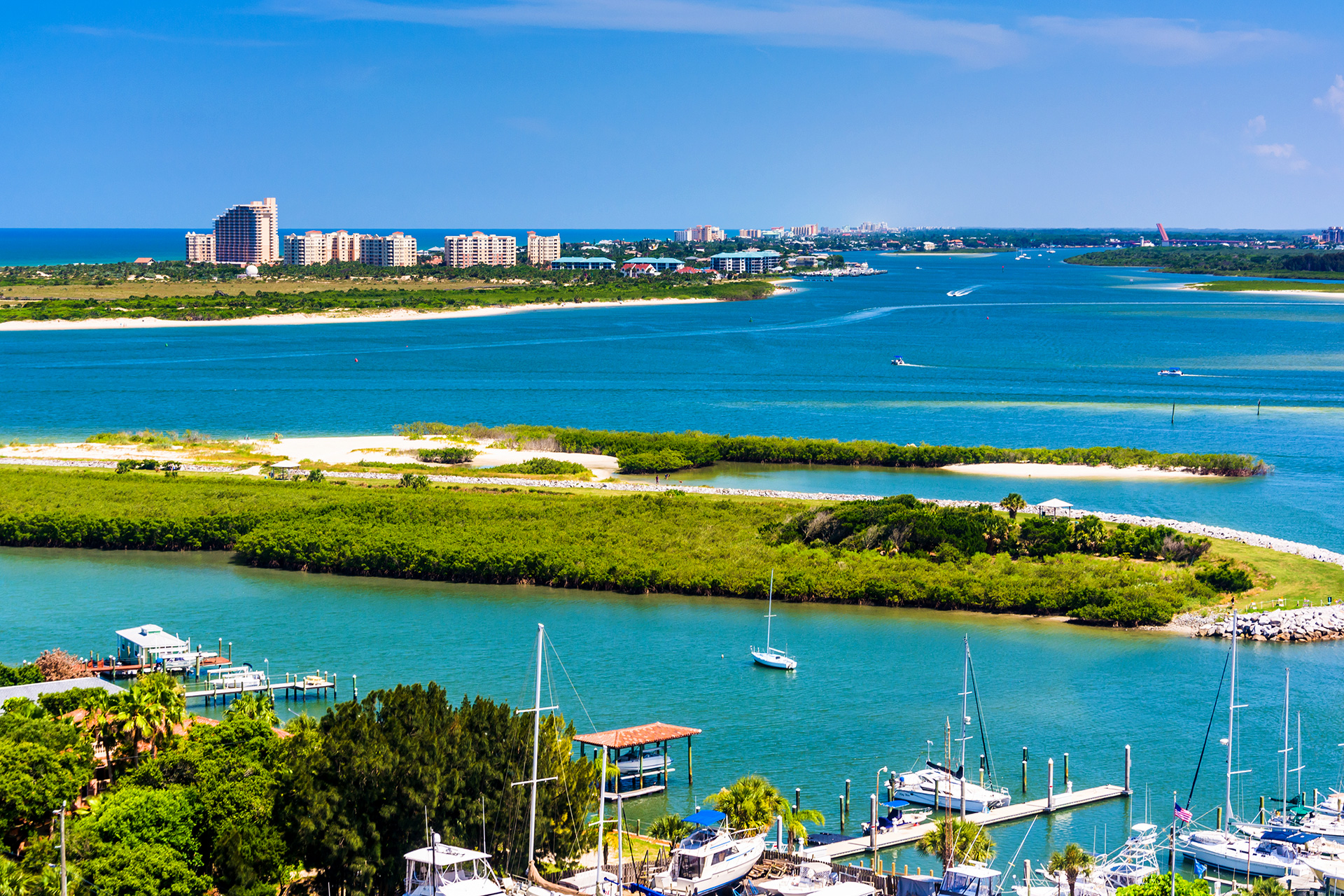 Courtesy of Jon Bilous/Shutterstock View of Ponce Inlet and New Smyrna Beach from Ponce de Leon Inlet Lighthouse