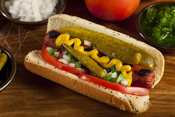A famous Chicago hot dog loaded up with mustard, relish, onions, and more.