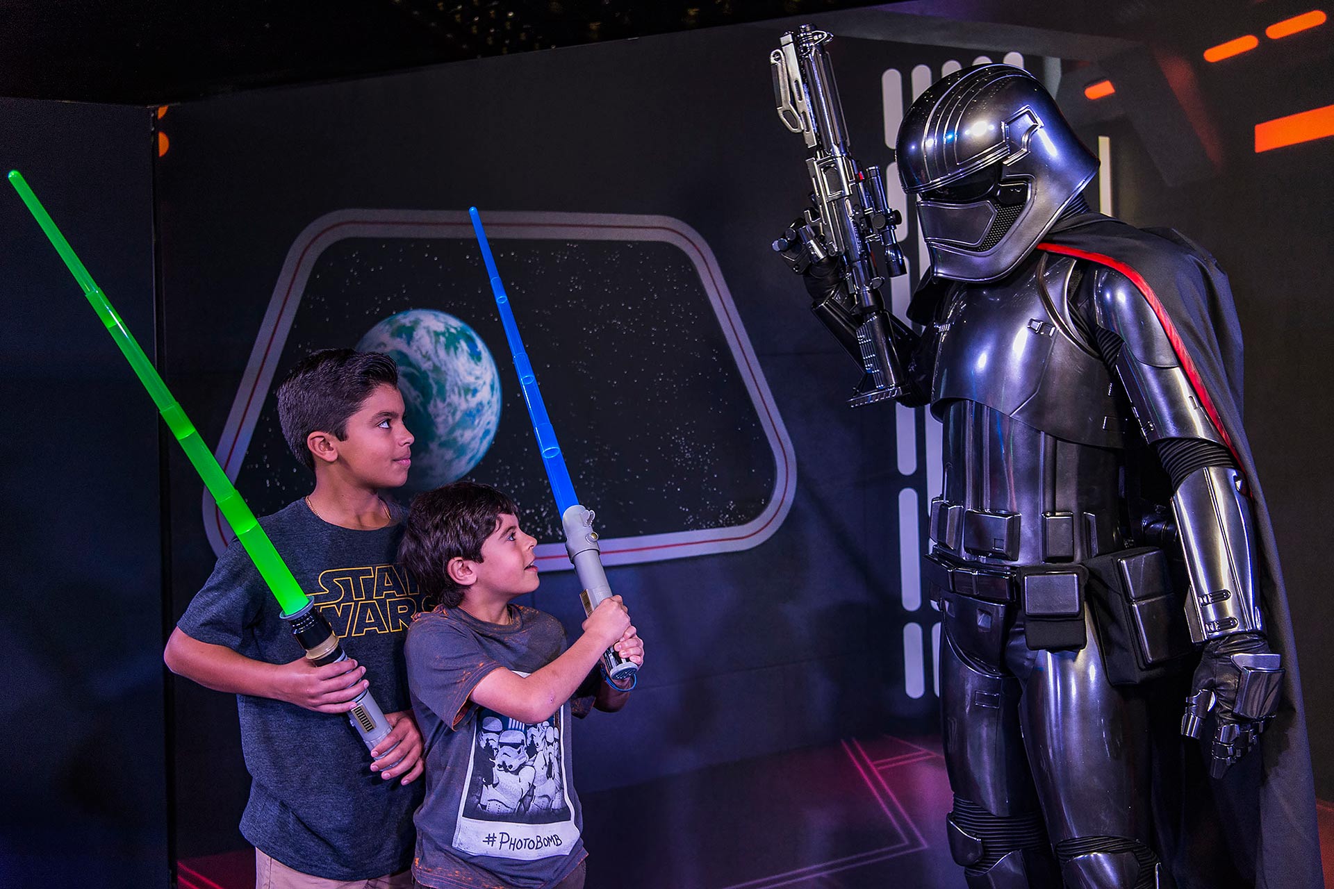 A little boy walking with Darth Vader and the Stormtroopers onboard the Disney Fantasy.