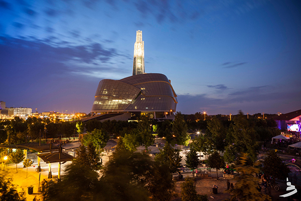 Canadian Museum of Human Rights lit up at night.