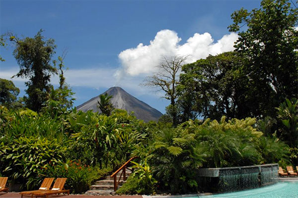 A view of the Arenal Volcano from the swimming pool at Tabacon Grand Spa Thermal Resort in Costa Rica.