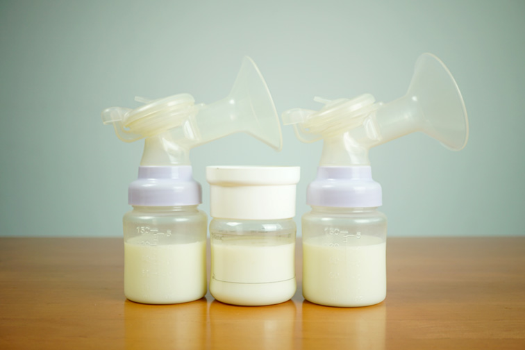 Breast milk packed in breast pump bags and bottles.; Courtesy of suwit 1313/Shutterstock