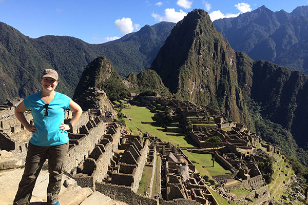 Judy Koutsky standing over Machu Picchu in Peru.