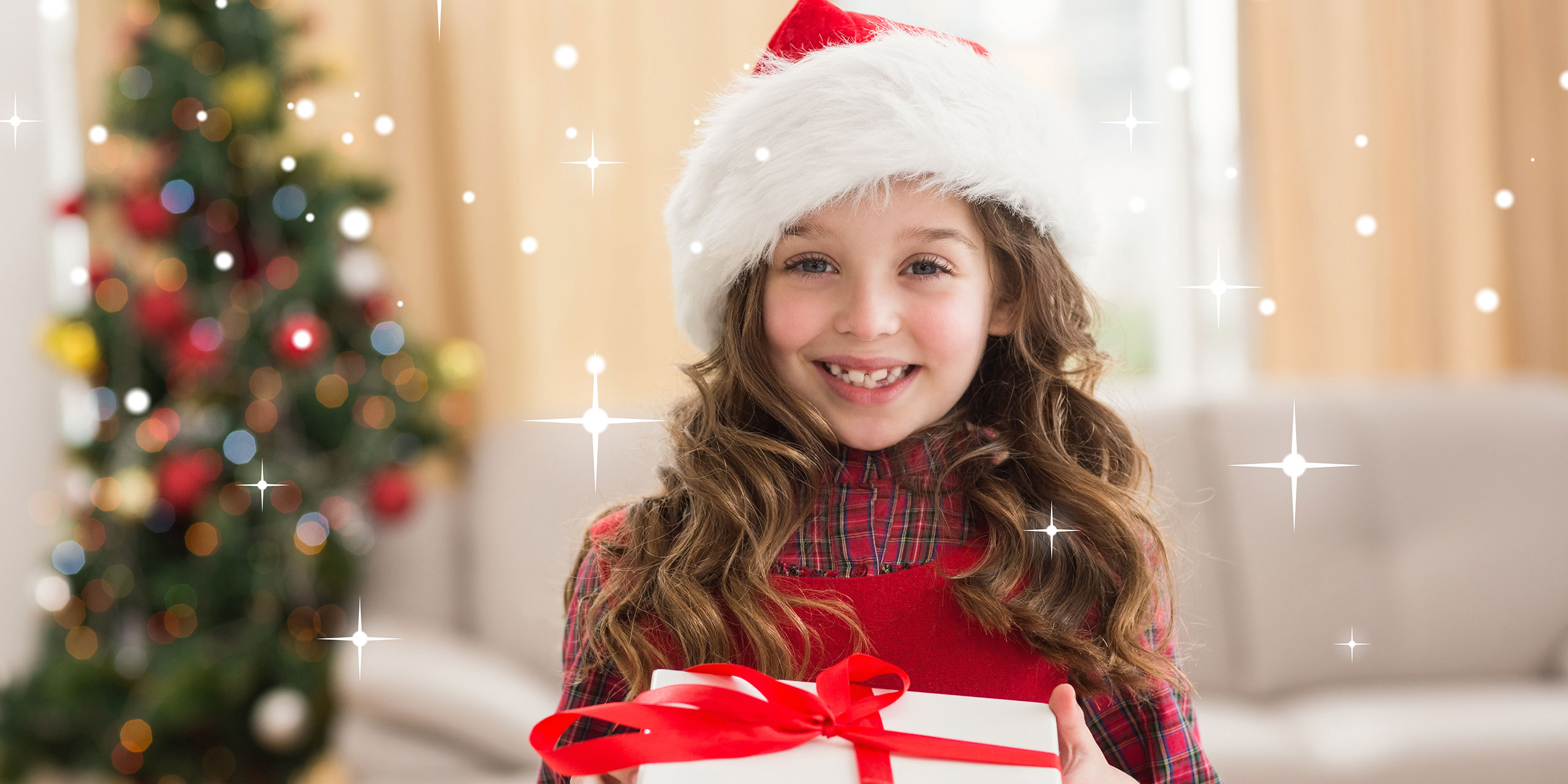 Tween Girl at Christmas; Courtesy of wavebreakmedia/Shutterstock.com