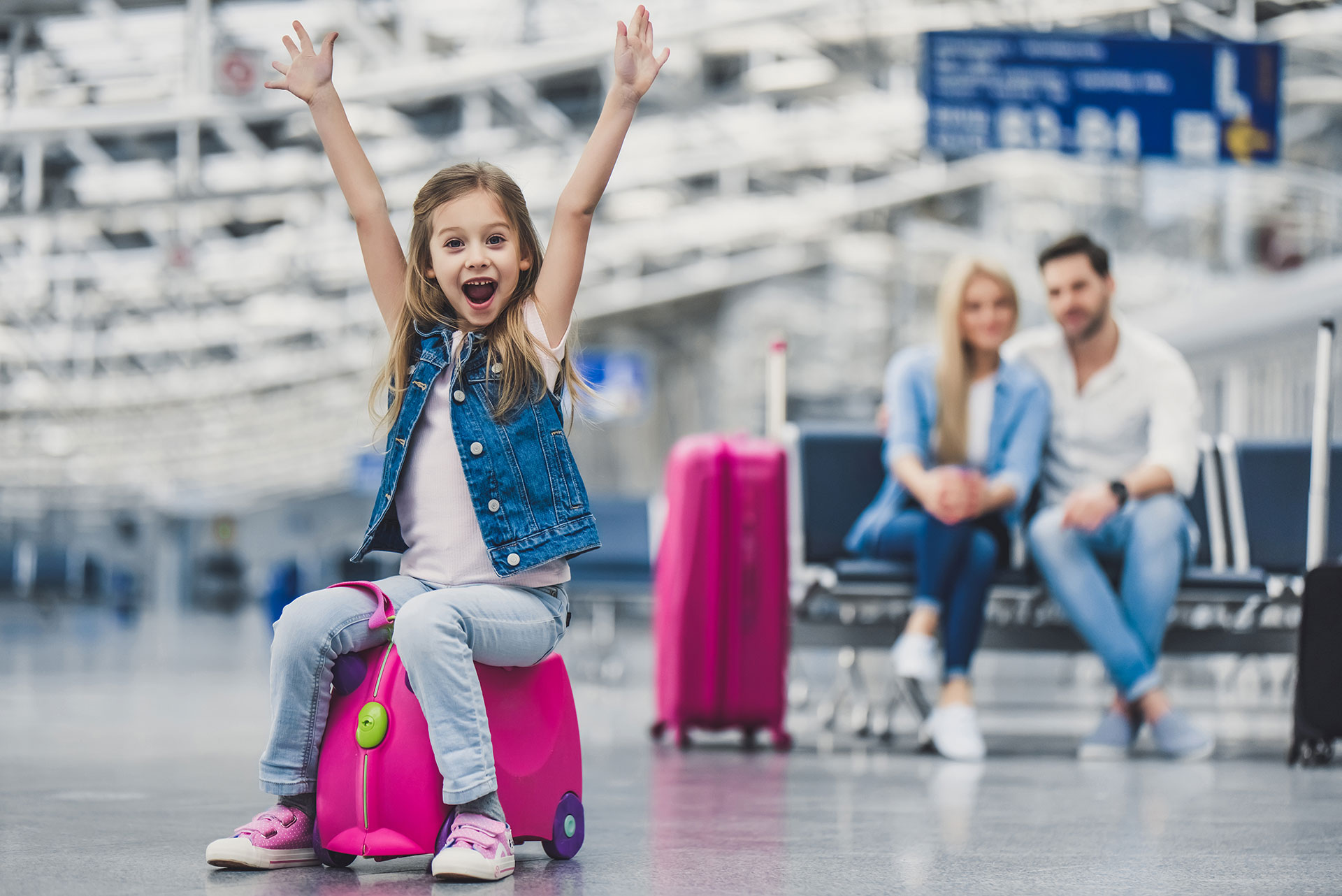 Girl Happy At The Airport; Courtesy of 4PM production/Shutterstock.com