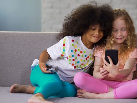 Kids with Gadgets; Courtesy of Motortion Films/Shutterstock.com