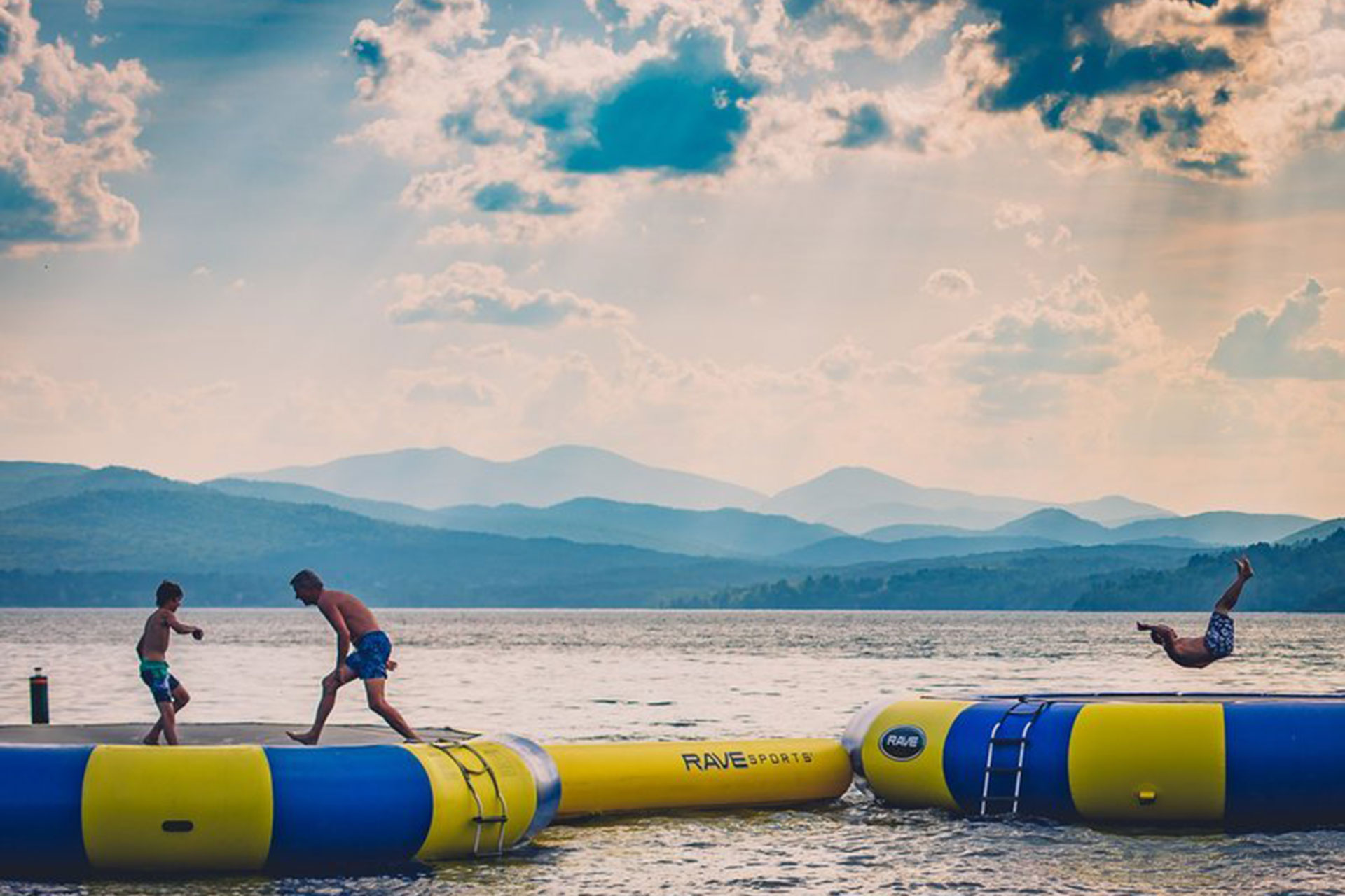 Kids Playing on Water Trampolines at Basin Harbor Resort in Vermont; Courtesy of Basin Harbor
