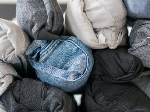 Rolled Clothes; Courtesy of BBPPHOTO/Shutterstock.com