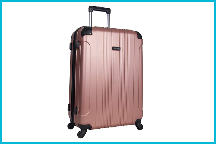 Rose gold hardside spinner luggage from Kenneth Cole