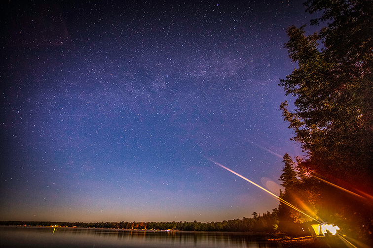 The Milky Way galaxy on a warm summer night near Onaway, Michigan; Courtesy of jeremydavis/Shutterstock