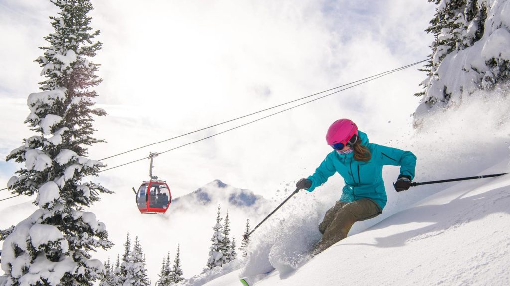 Courtesy of Crystal Mountain Resort Woman skiing at Crystal Mountain Resort