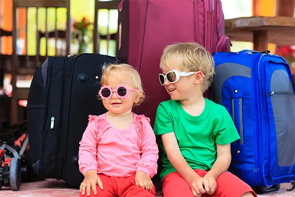 Toddlers at Airport Wearing Sunglasses