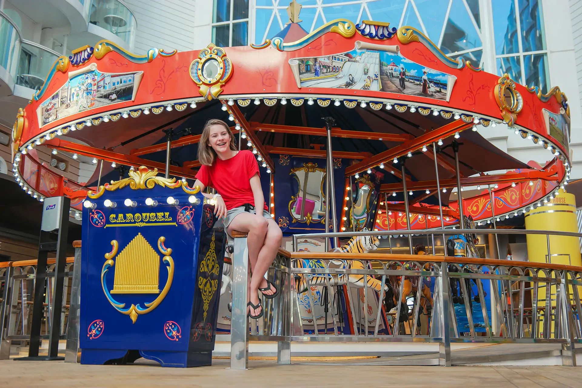 Teen Girl in Front of Carousel on Royal Caribbean's Symphony of the Seas