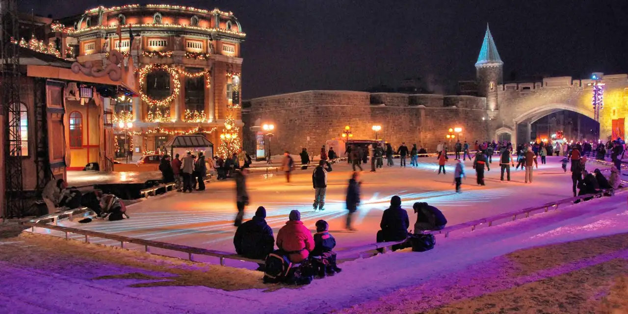 People ice skating at the Place d'Youville in Quebec