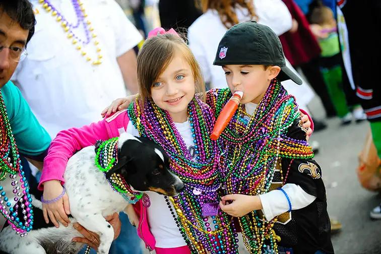 new orleans mardi gras kids with dog; Courtesy Lindsey Janies