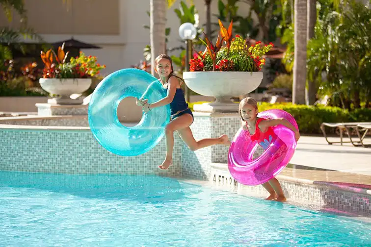 Little Girls Playing in Pool at Hilton Orlando Lake Buena Vista