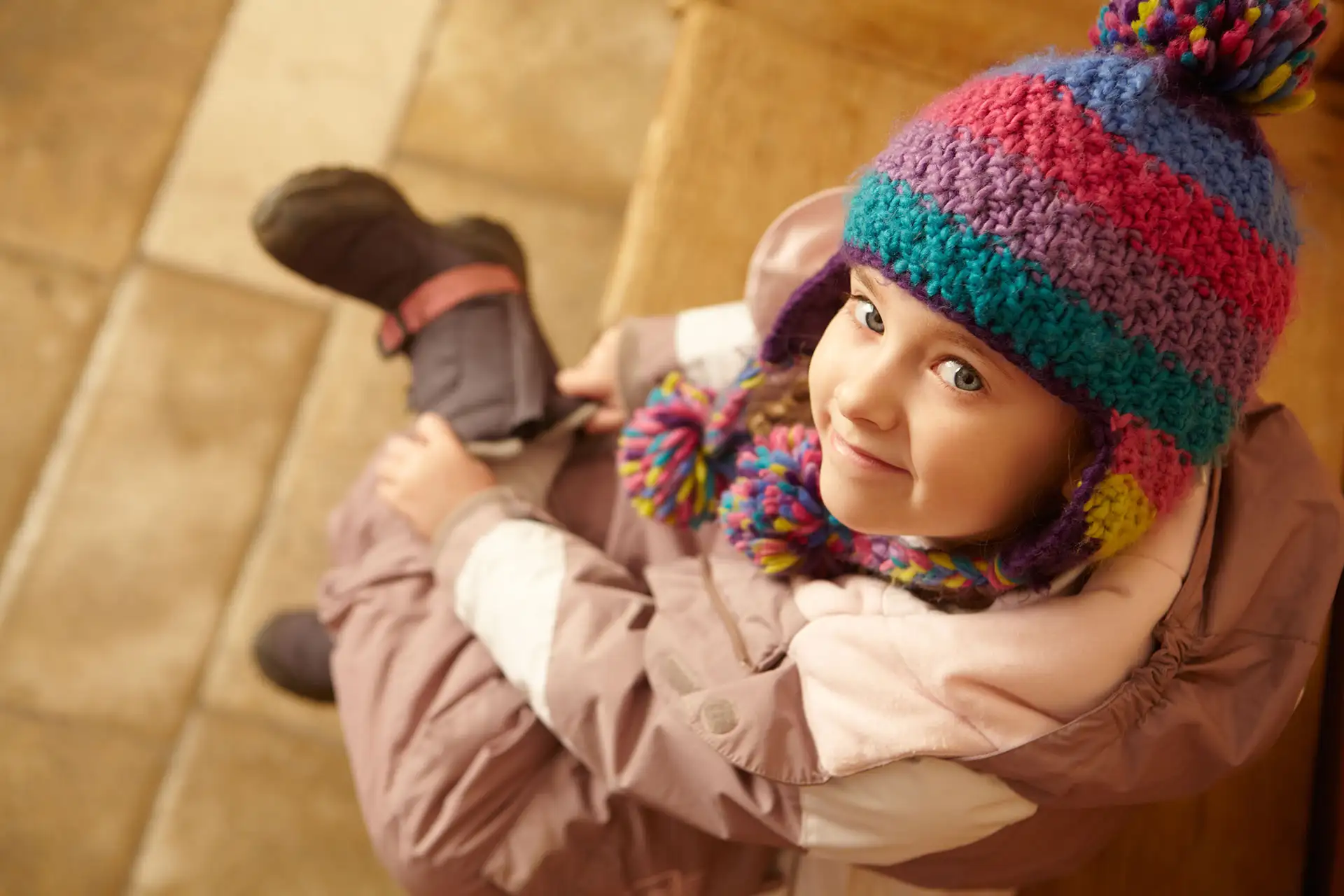 A little girl getting ready to hit the slopes.; Courtesy of Monkey Business Images/Shutterstock.com