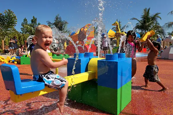 A little boy playing at the LEGOLAND California Water Park.