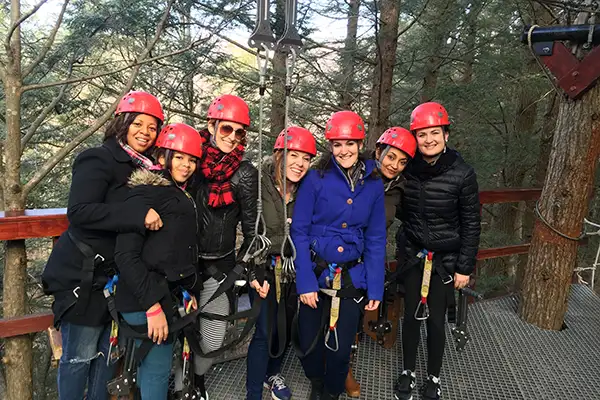 A group participating in the Mid-Mountain Tour with Zip Line New York.