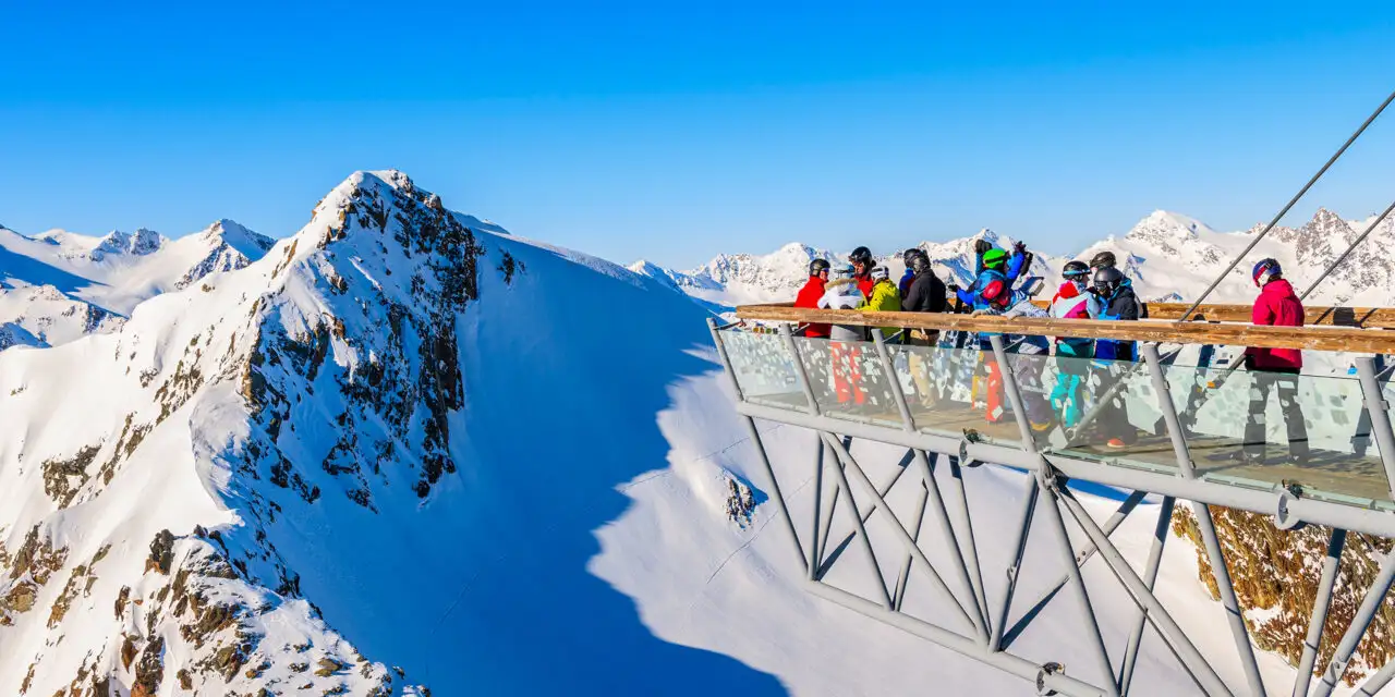 Skiers looking at mountains from platform in Solden ski ; Courtesy of Pawel Kazmierczak/Shutterstock