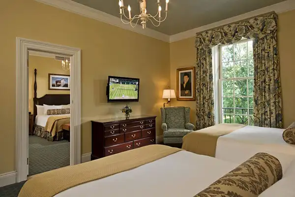 A Double Deluxe Queen Connecting Room at The Otesaga Resort Hotel in Cooperstown, New York.