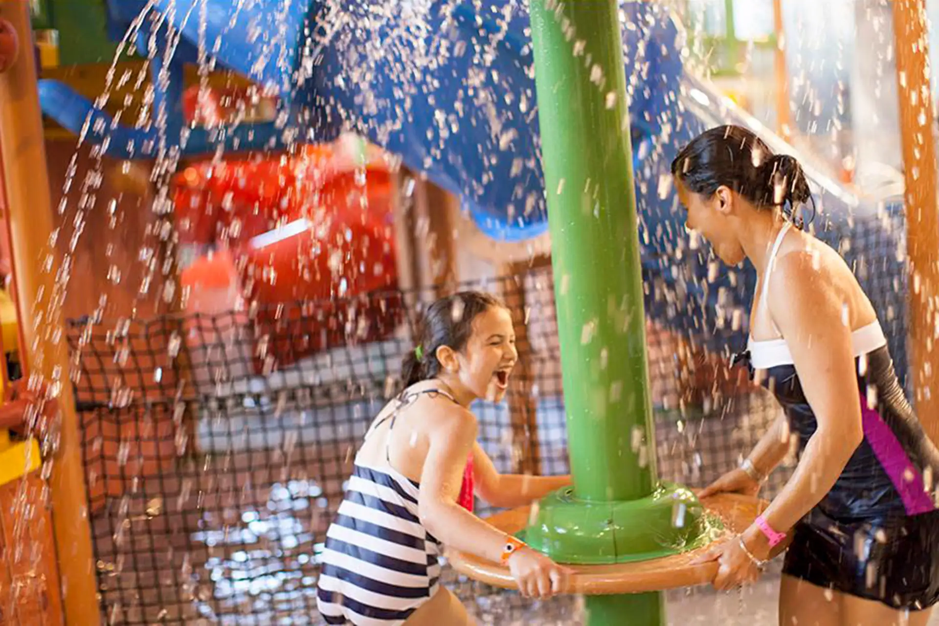 mom plays at waterpark with daughter; Courtesy of Great Wolf Lodge Wisconsin Dells