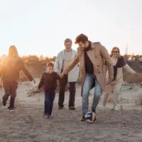 Multigenerational Family on the Beach; Courtesy of LightField Studio/Shutterstock.com