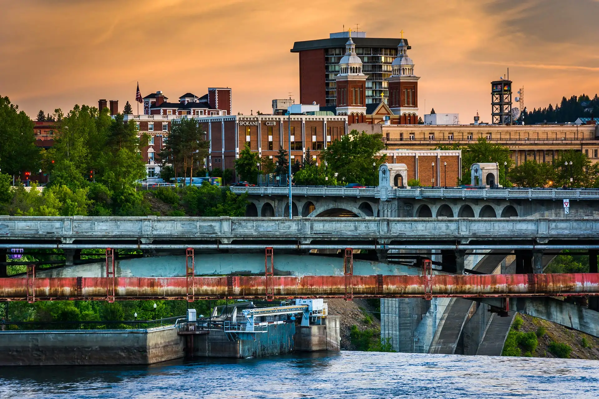 Bridges over the Spokane River and buildings at sunset in Washington