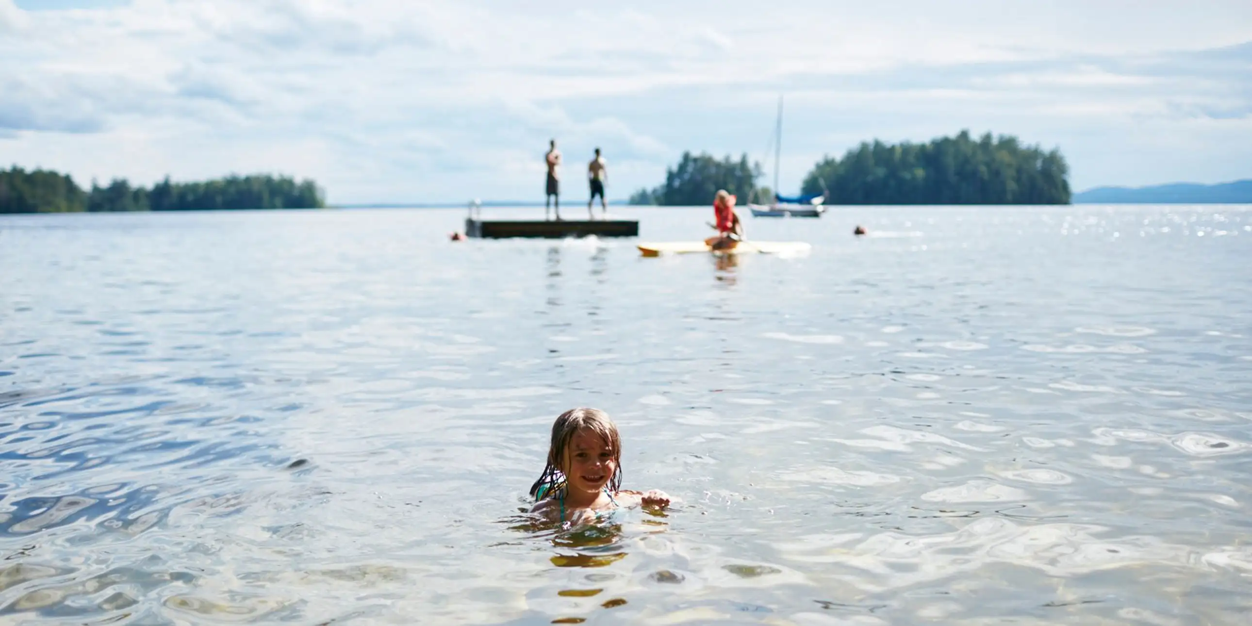 Little Girl Swimming at Migis Lodge in South Casco, ME; Courtesy of Migis Lodge