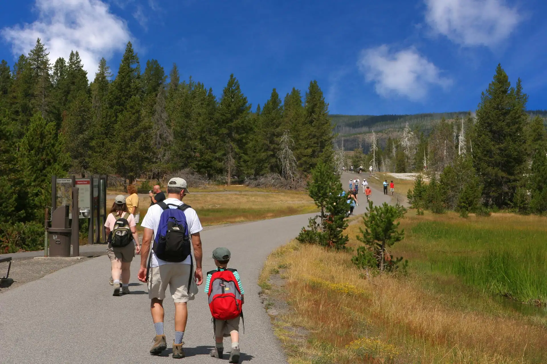 A family hiking at Yellowstone National Park.