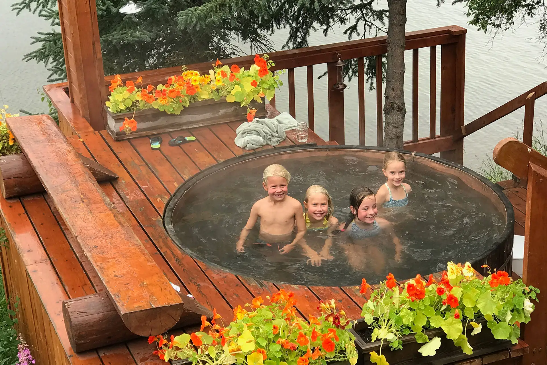 Kids in Hot Tub at Tordrillo Mountain Lodge; Courtesy of Tordrillo Mountain Lodge