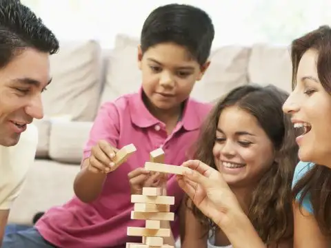 Family Playing Game; Courtesy of Monkey Business Images/Shutterstock.com