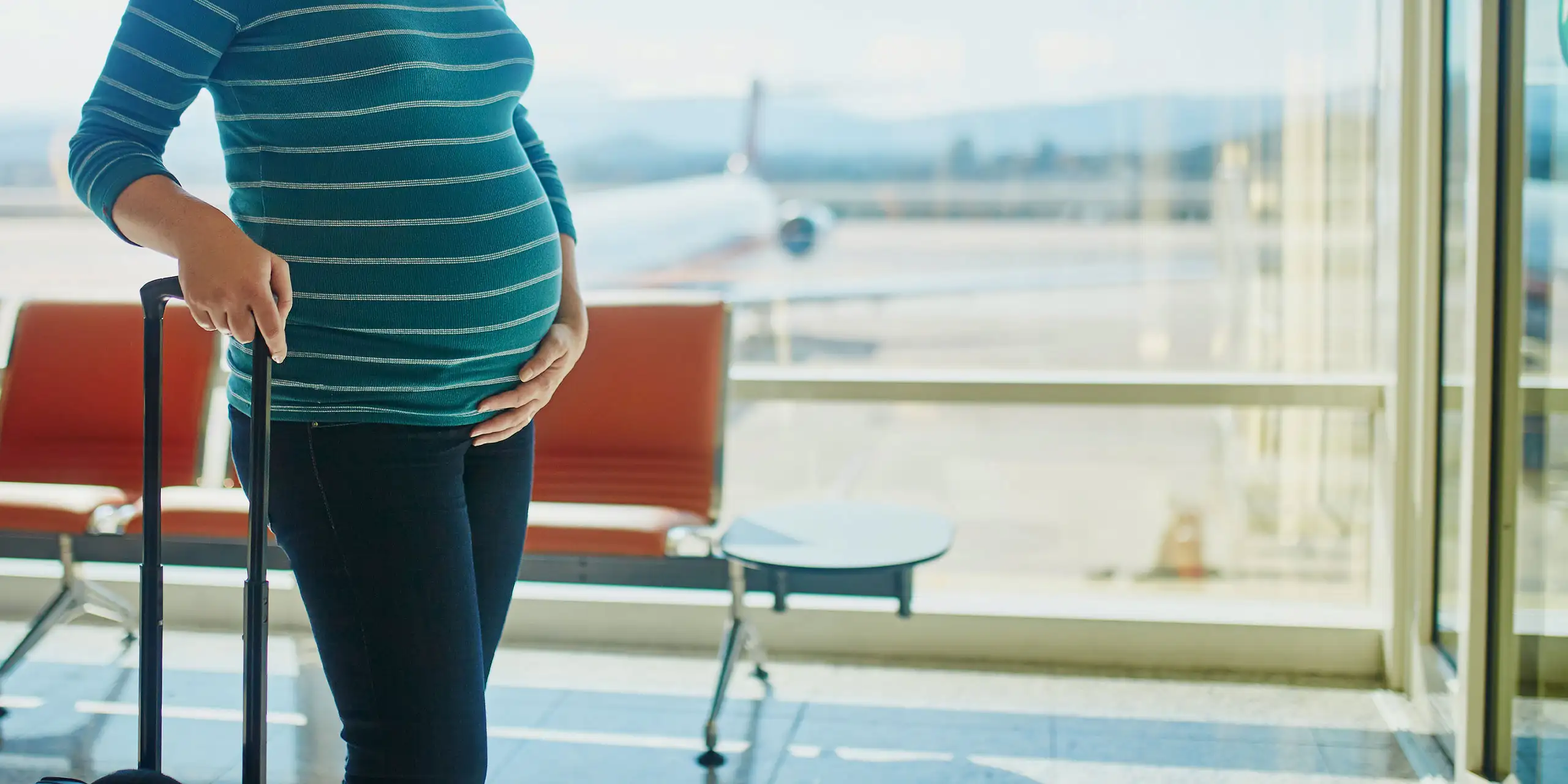 Pregnant Woman Traveling; Courtesy of Ekaterina Pokrovsky/Shutterstock.com