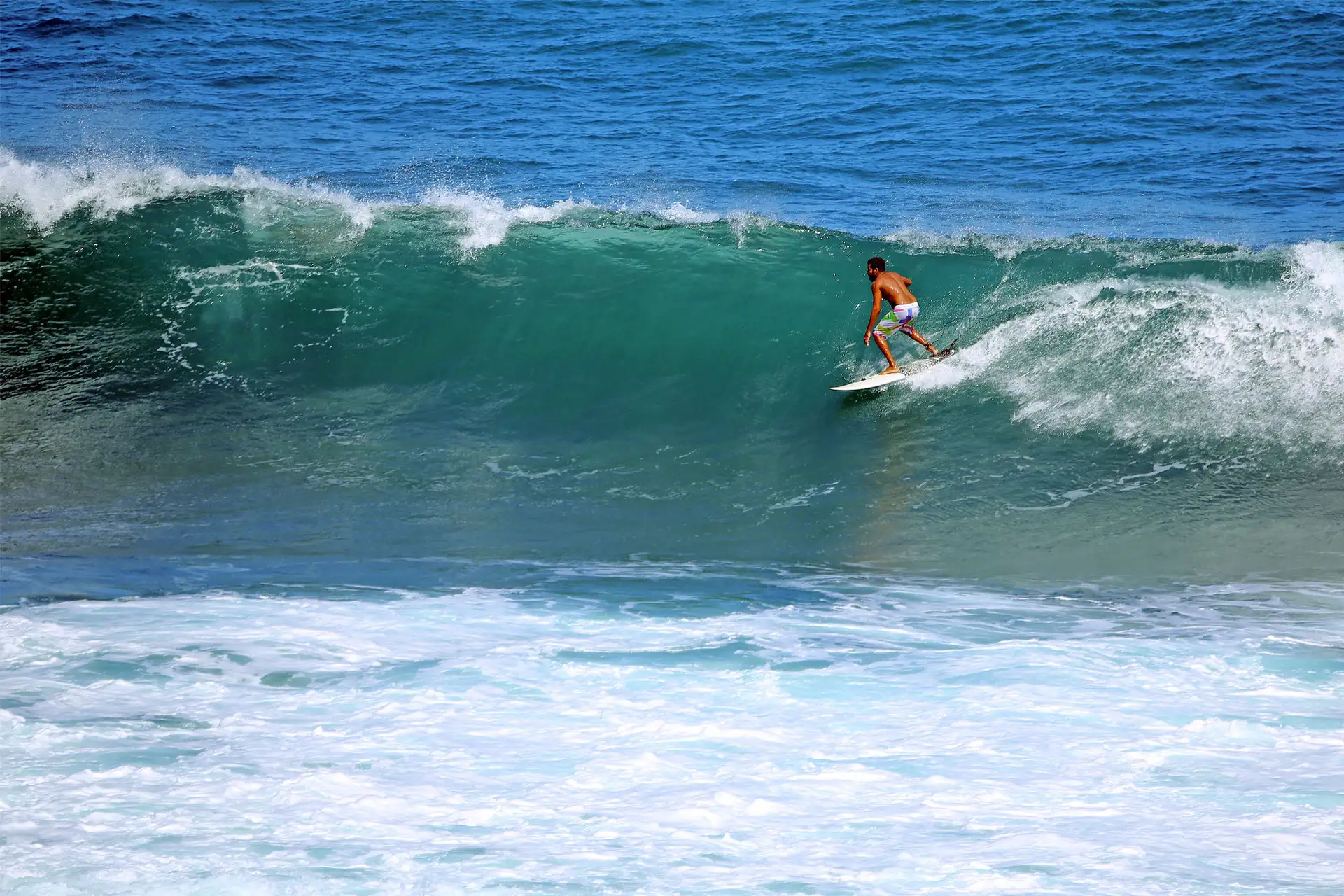 Surfing in Barbados; Courtesy of Ralph Eshelman/Shutterstock.com