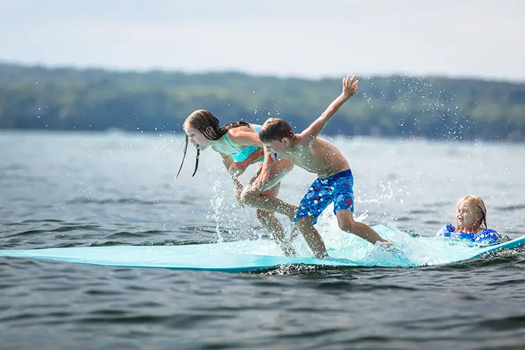 Kids Swimming in Geneva Lake in Lake Geneva, Wisconsin
