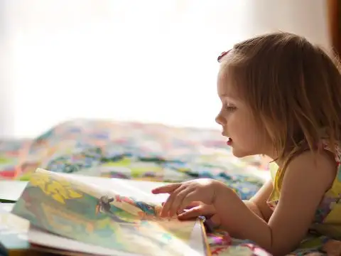 Young Girl Reading; Courtesy of Tatiana Bobkova/Shutterstock.com