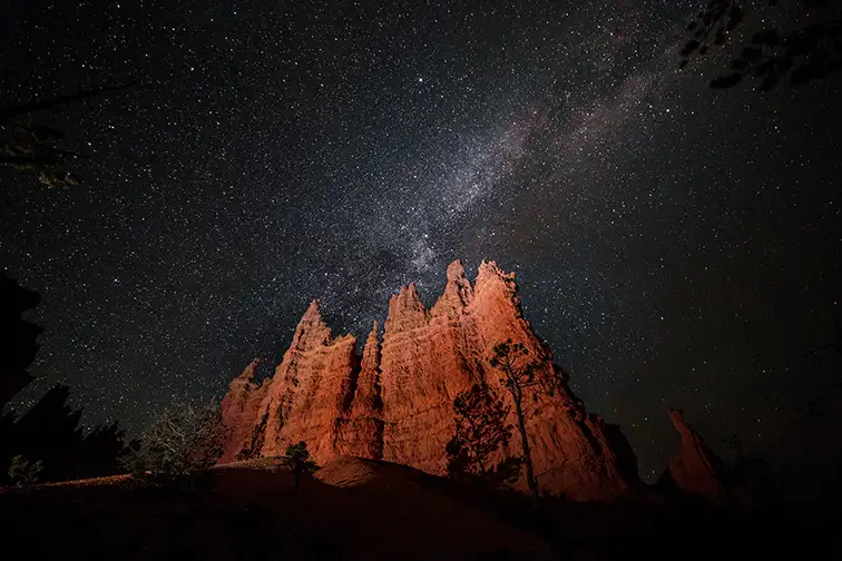 starry sky over bryce national park in utah; Courtesy of ericharris/Shutterstock