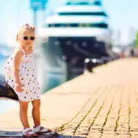 Little Girl in Cruise Port; Courtesy of Natalia Kirichenko/Shutterstock.com
