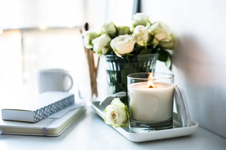 candle in home interior; Courtesy Daria Minaeva/Shutterstock