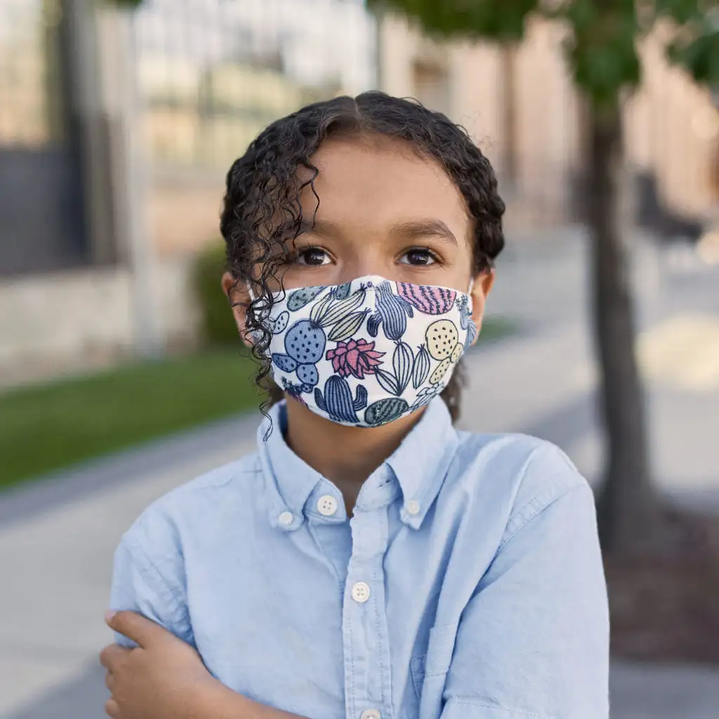 Honest Young girl wearing Honest Company Kids Cotton Face Masks