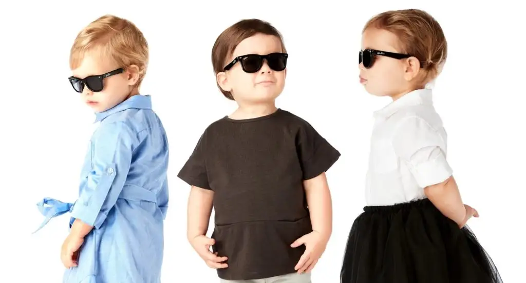 Three toddlers wearing WeeFarer sunglasses