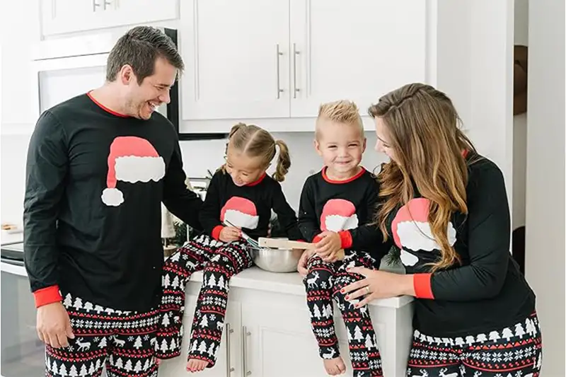 Family wearing matching holiday pajamas